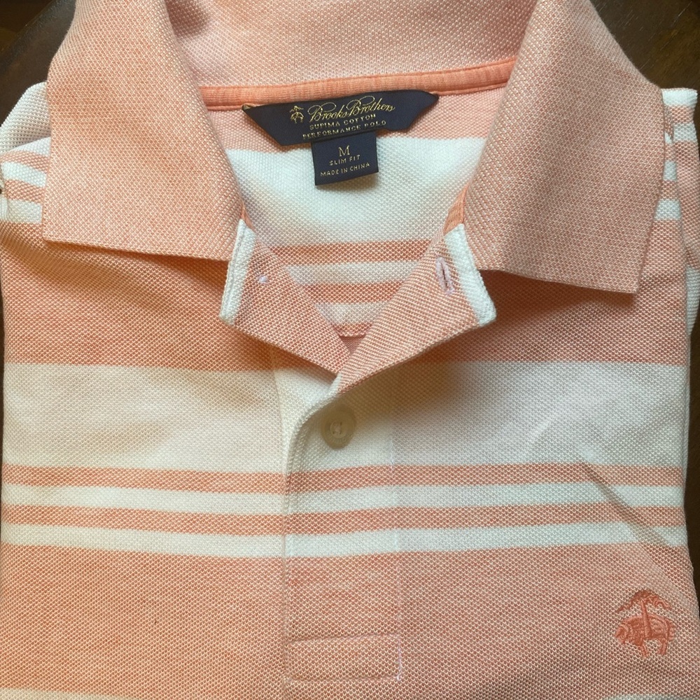 Brooks Brother’s short sleeved pink & white striped polo.  Like new.